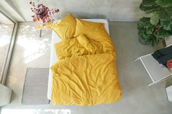 Bettwäsche aus Bio-Baumwolle von lavie. Nachhaltige Bettbezüge aus Bio Baumwolle in honey gelb